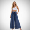 Casual γυναικείο denim palazzo παντελόνι με φαρδιά μπατζάκια και κορδόνι στη μέση, τέλειο για καλοκαιρινό και μοντέρνο look.