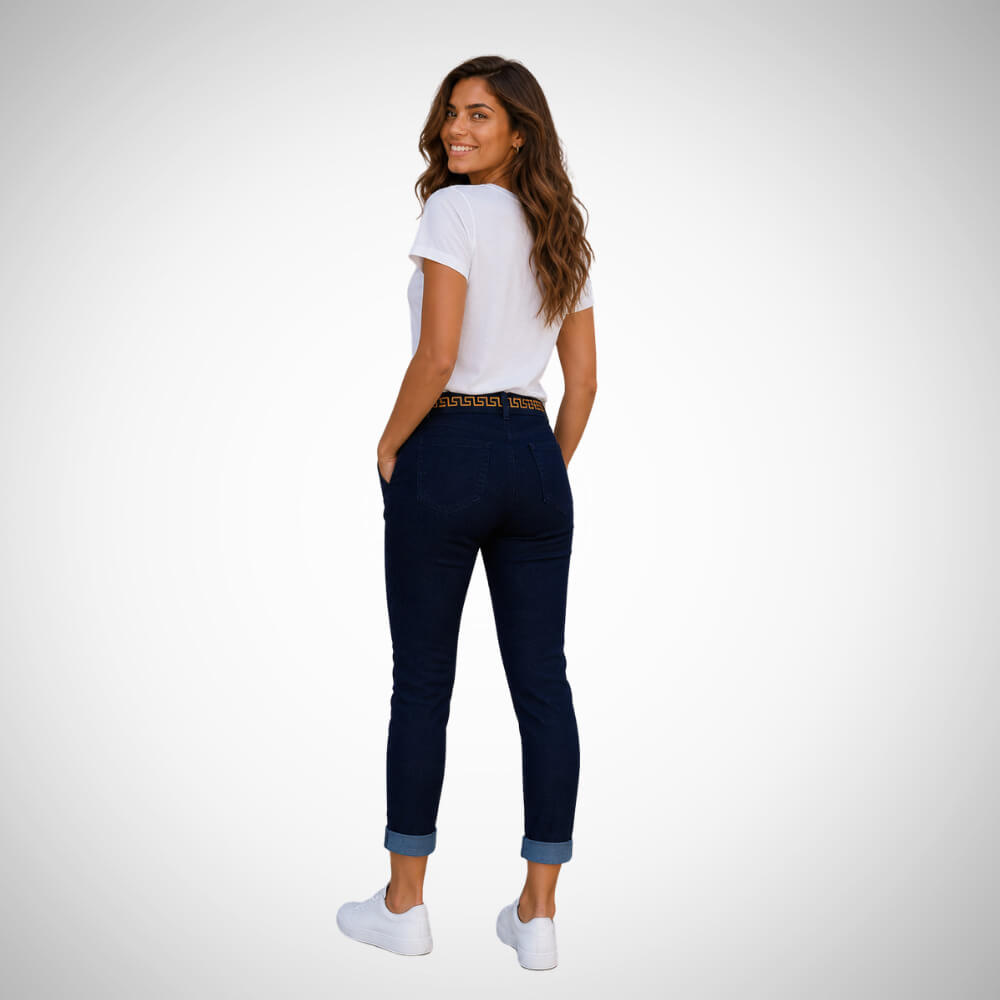 Γυναικείο σκούρο μπλε παντελόνι slim fit με ρεβέρ στο τελείωμα και διακοσμητική υφασμάτινη ζώνη για κομψό casual look.