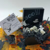 Δώρο Σετ 15 Boo Wax Melts σε μαύρο Halloween Box, με λευκά φαντασματάκια άρωμα spiced bourbon pumpkin κολοκύθα.