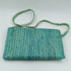 Τιρκουάζ clutch τσάντα με διακόσμηση από χάντρες και boho λεπτομέρειες