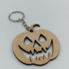 Ξύλινο μπρελόκ κολοκύθα Halloween με τρομακτικό πρόσωπο