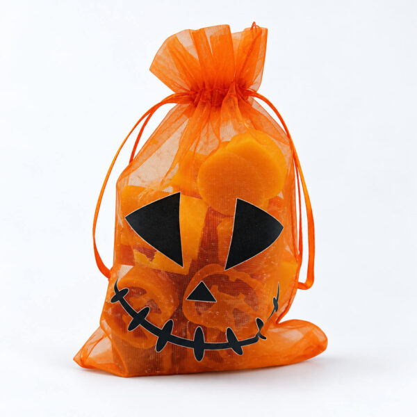 14 αρωματικά Wax Melts Halloween Pumpkin Soufflé σε πορτοκαλί πουγκί με πρόσωπο κολοκύθας