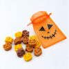 Πορτοκαλί πουγκί Halloween με μαύρο προσωπάκι κολοκύθας και 14 αρωματικά wax melts
